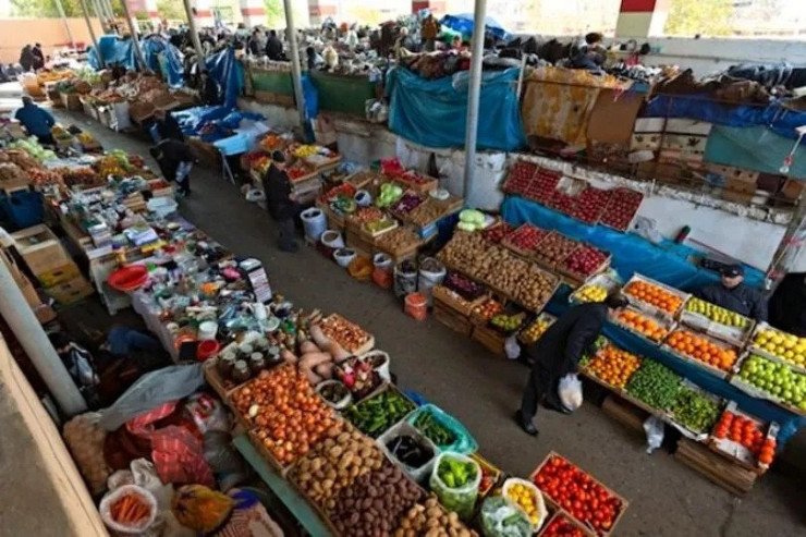 Bazarda 3 nəfəri aldadıb pullarını aldı